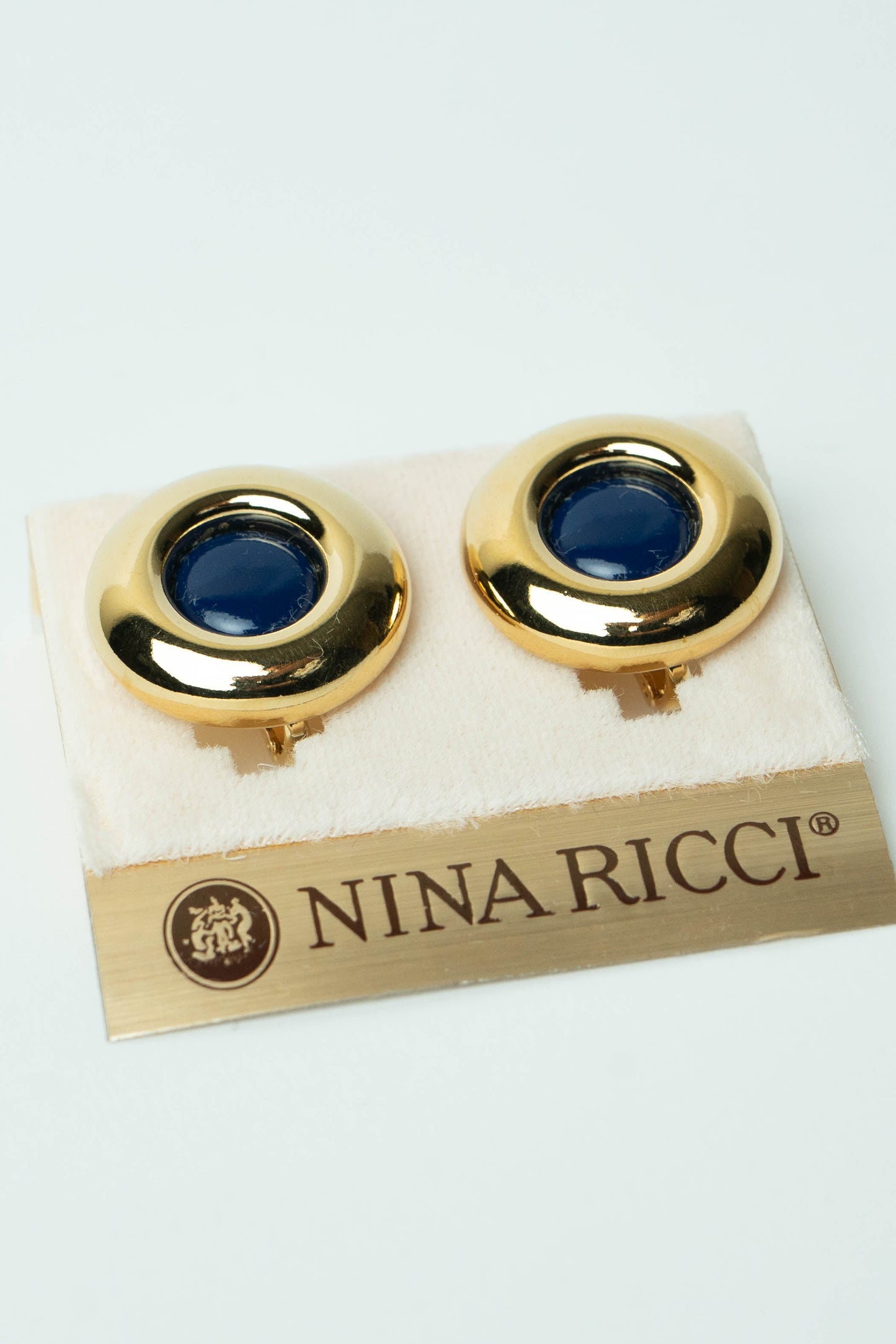 The Nina Ricci Éclat Bleu Button Earrings
