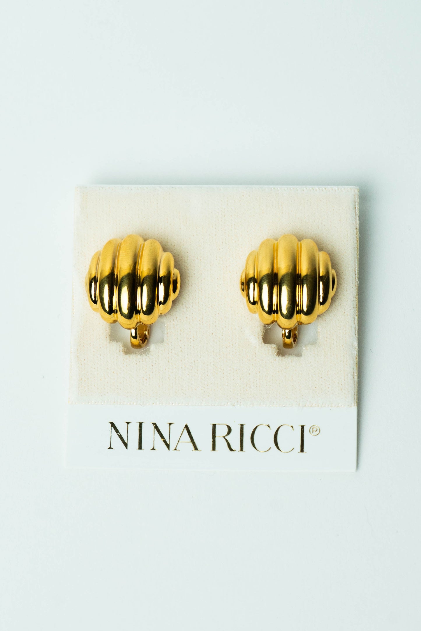 The Nina Ricci Coquille Ribbed Button Earrings