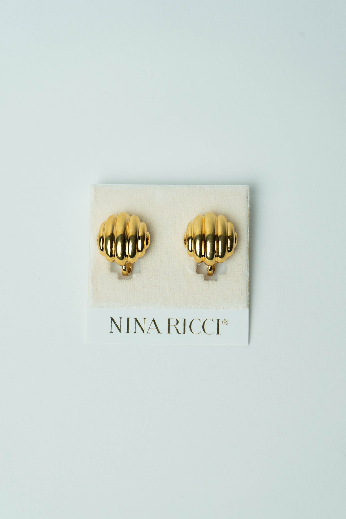 The Nina Ricci Coquille Ribbed Button Earrings