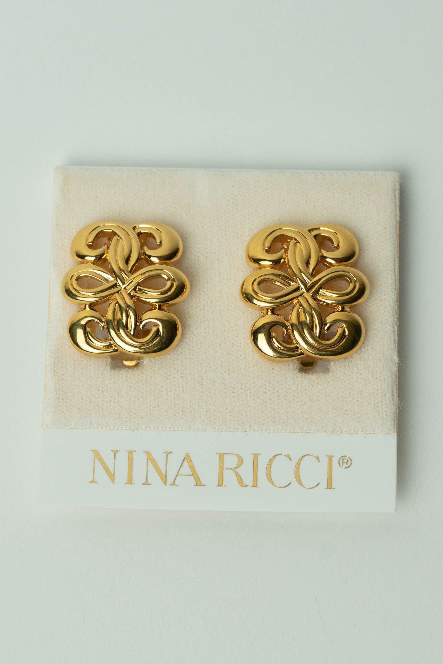 The Nina Ricci Entrelacs Woven Button Earrings