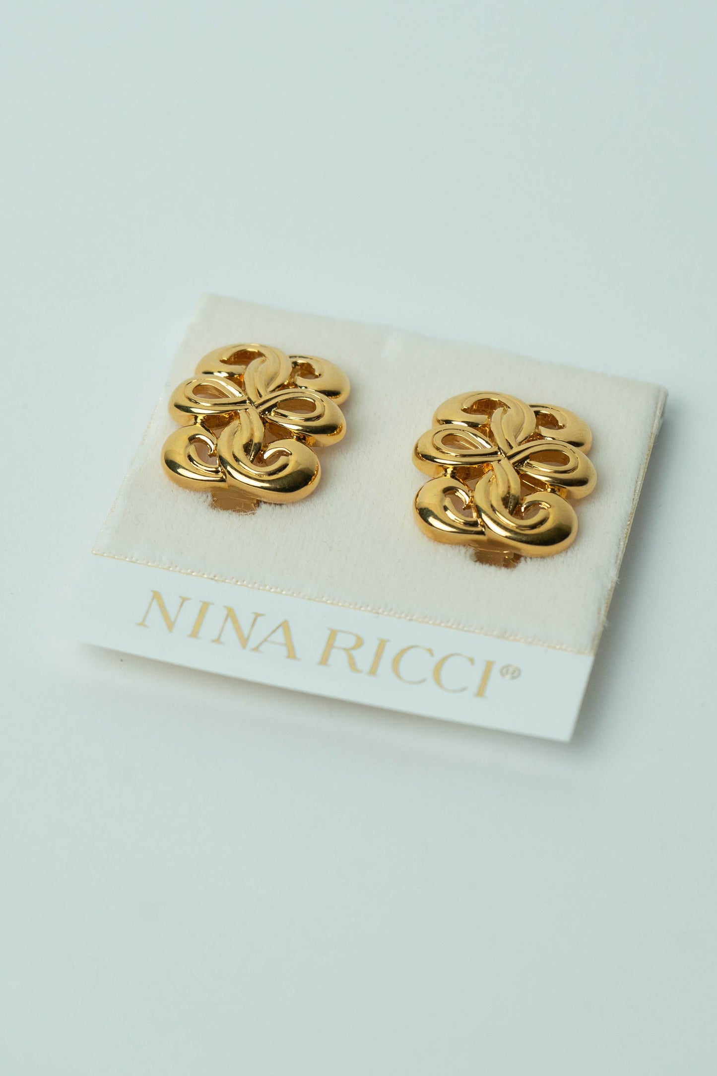 The Nina Ricci Entrelacs Woven Button Earrings