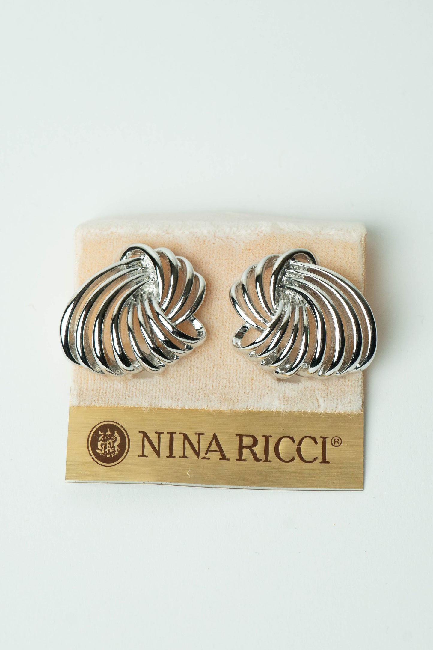 The Nina Ricci Tourbillon Openwork Silver Earrings