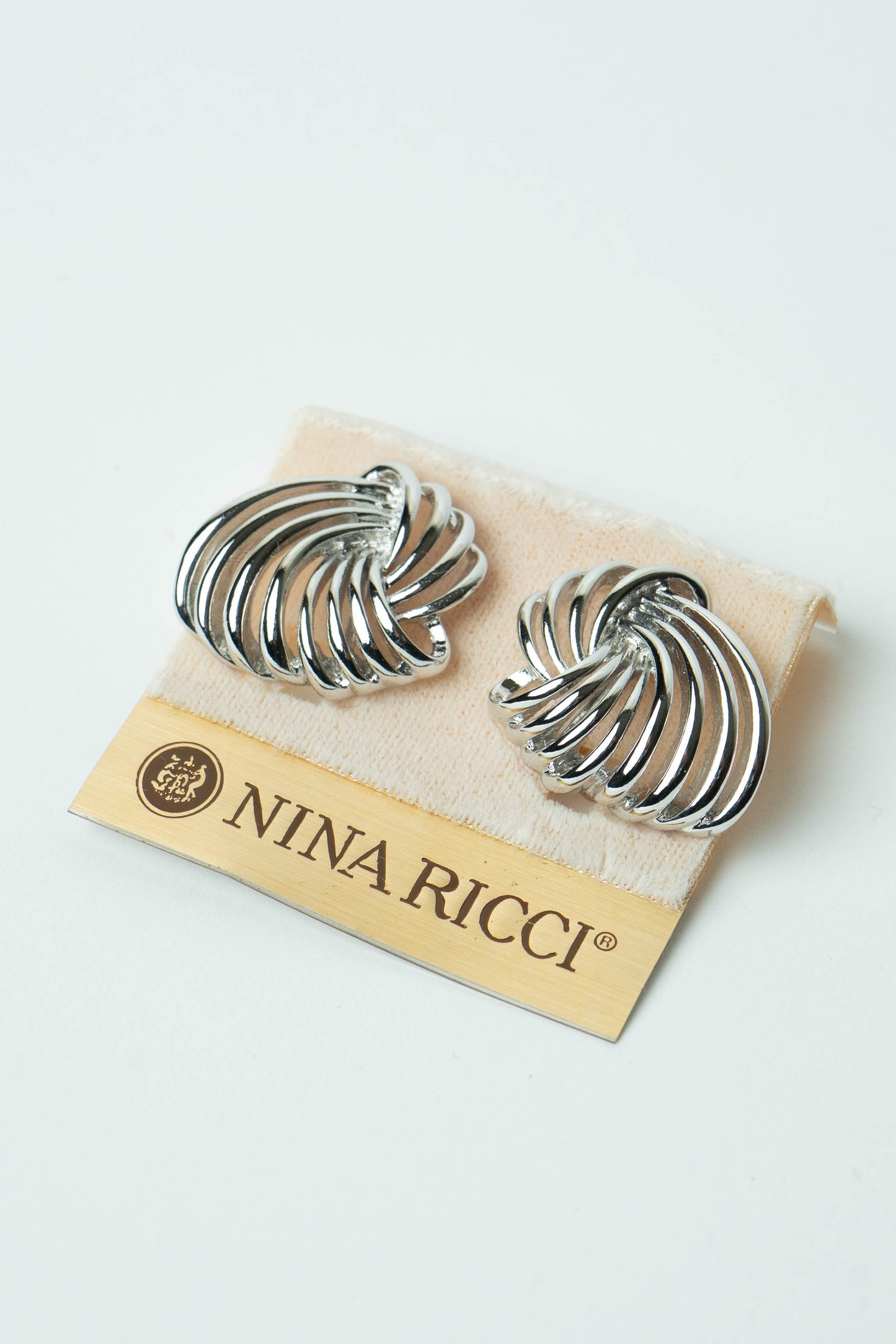 The Nina Ricci Tourbillon Openwork Silver Earrings