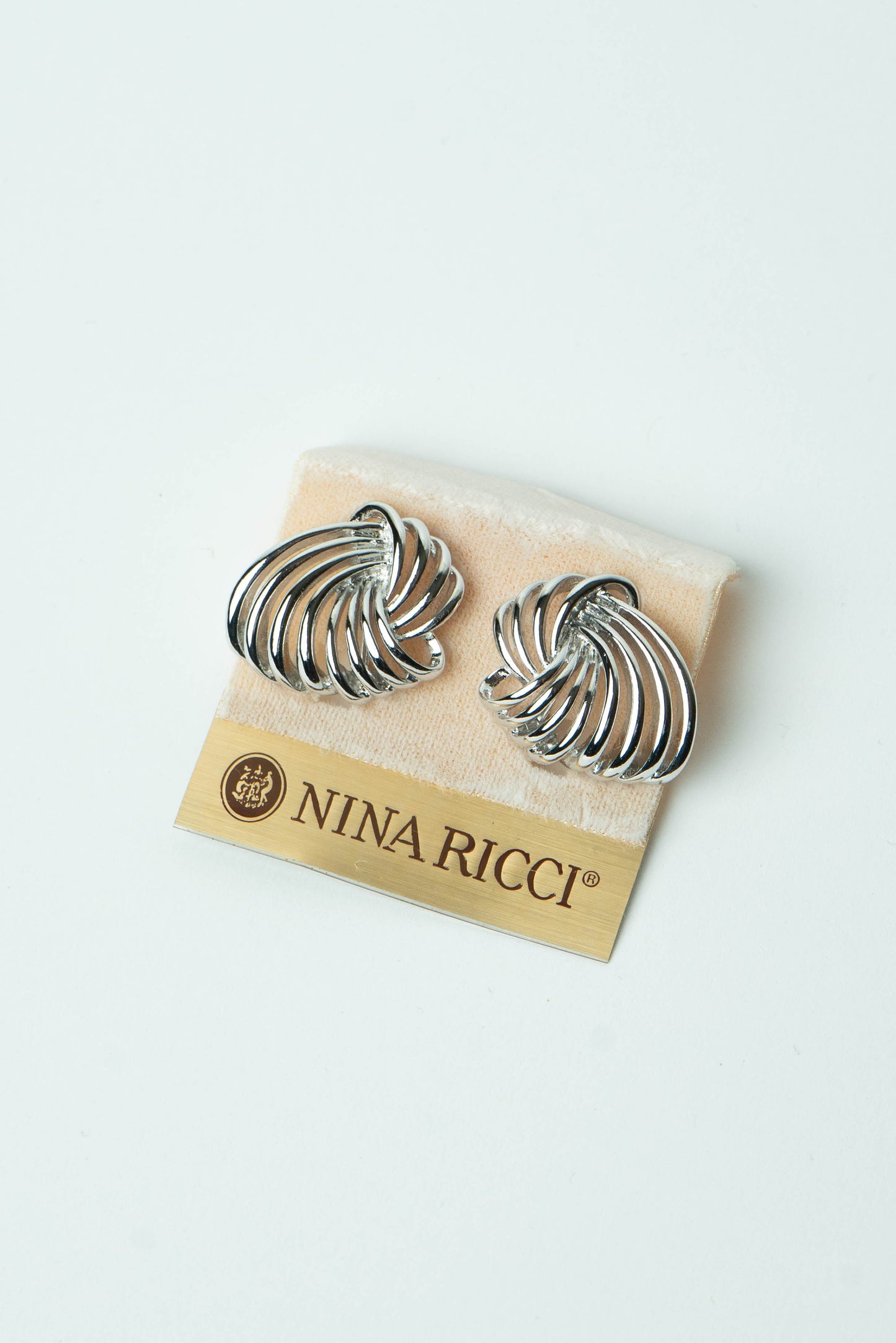 The Nina Ricci Tourbillon Openwork Silver Earrings