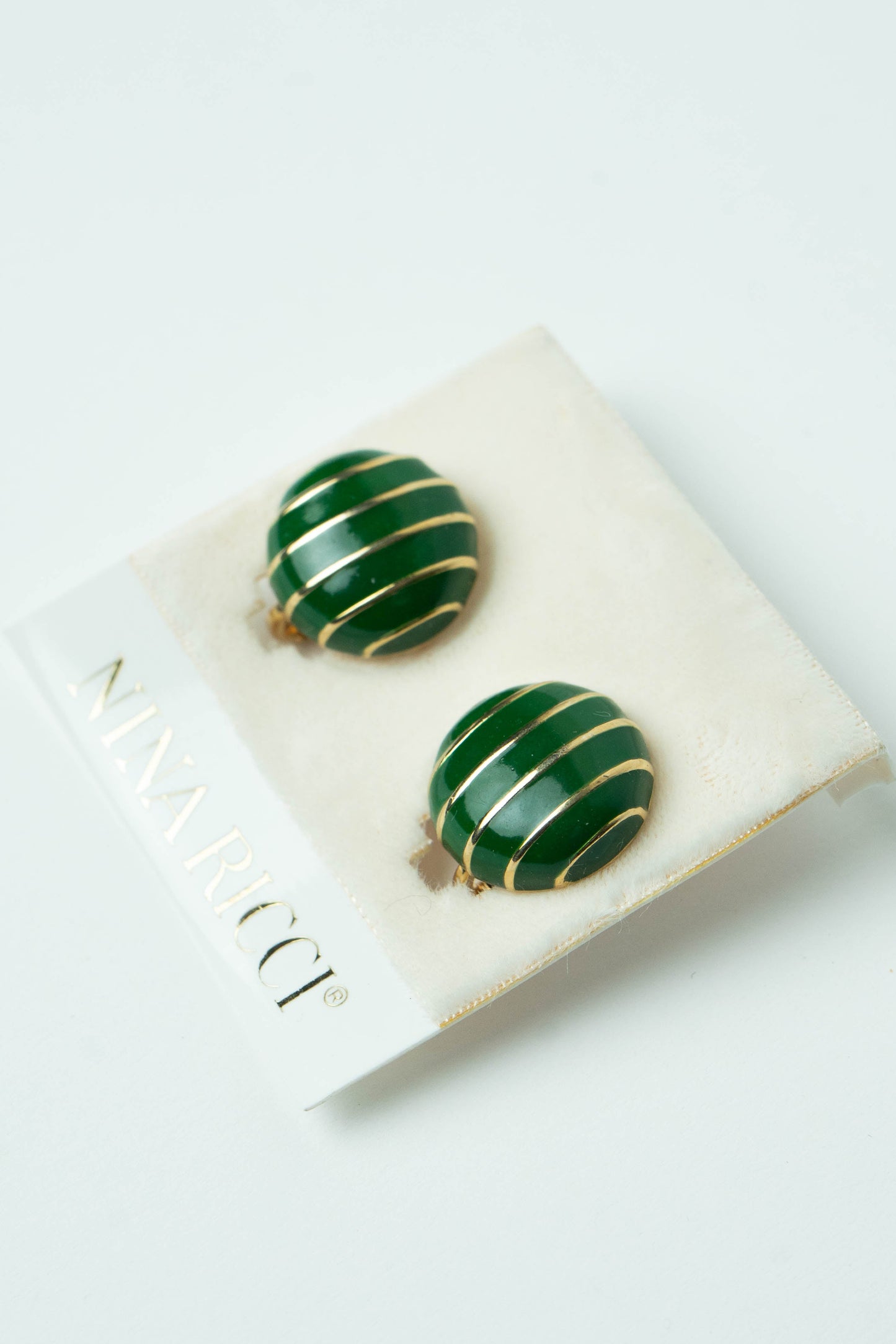 The Nina Ricci Rayure Enamel Button Earrings