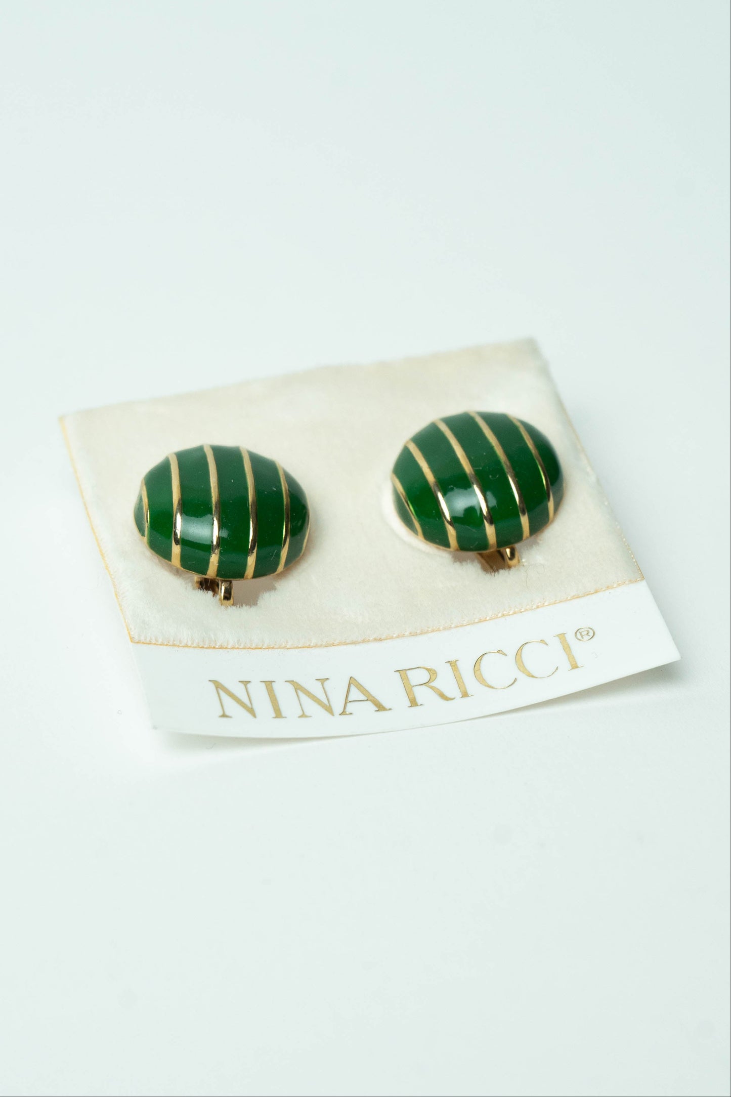 The Nina Ricci Rayure Enamel Button Earrings