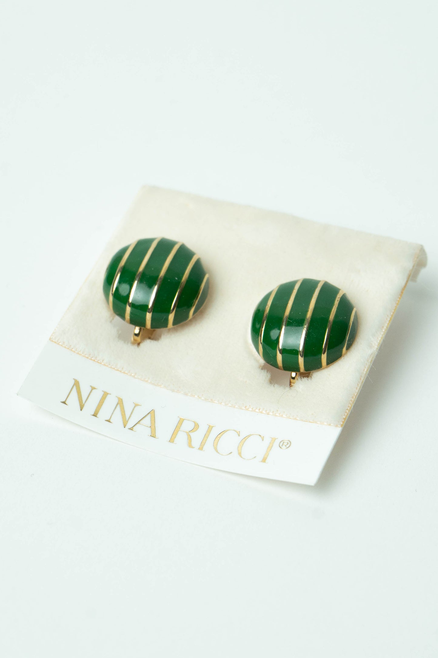 The Nina Ricci Rayure Enamel Button Earrings