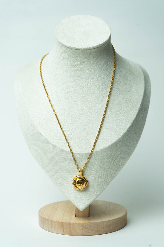 The Nina Ricci Médaillon Rayon de Soleil Necklace