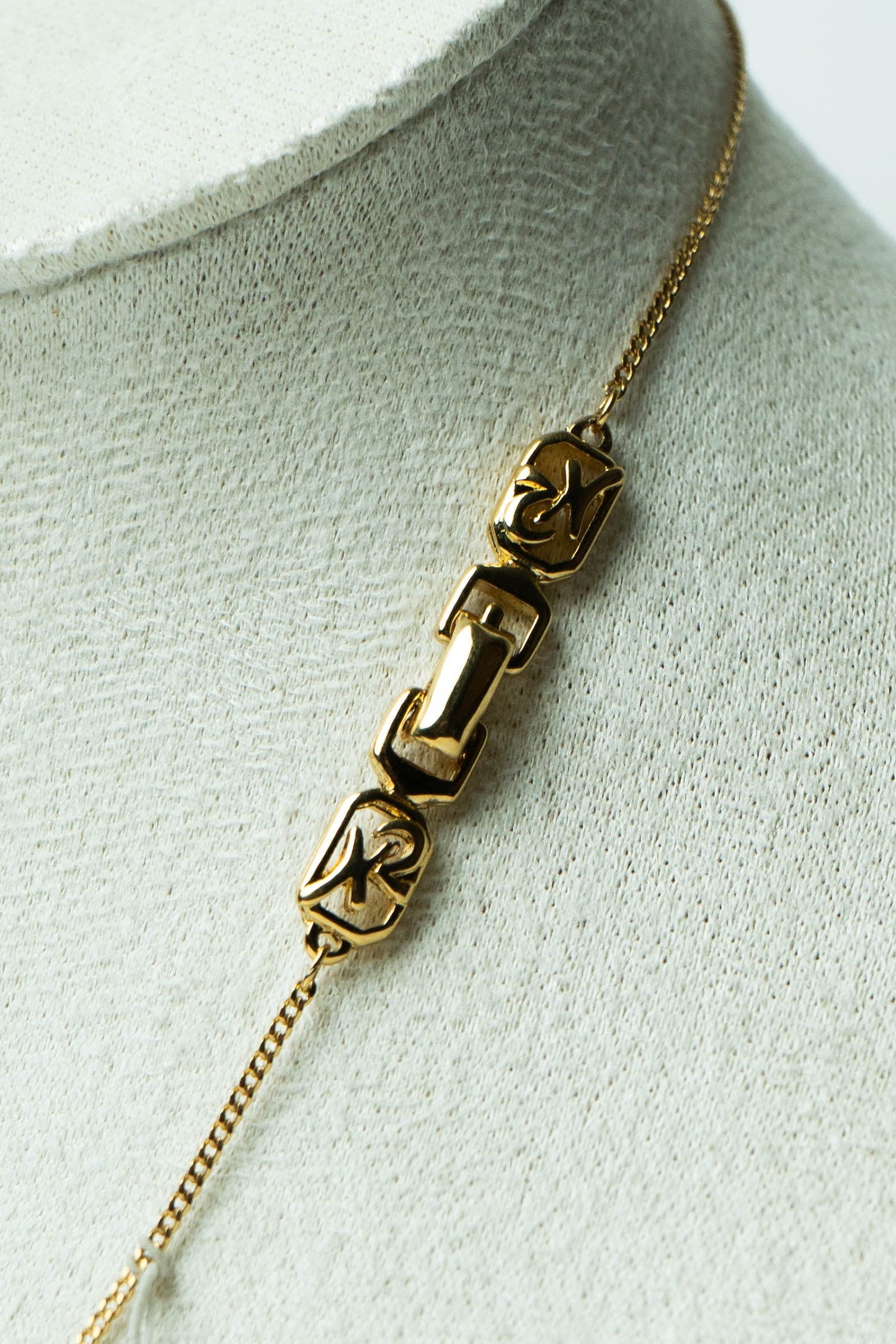 The Nina Ricci Écusson Monogramme Pendant Necklace