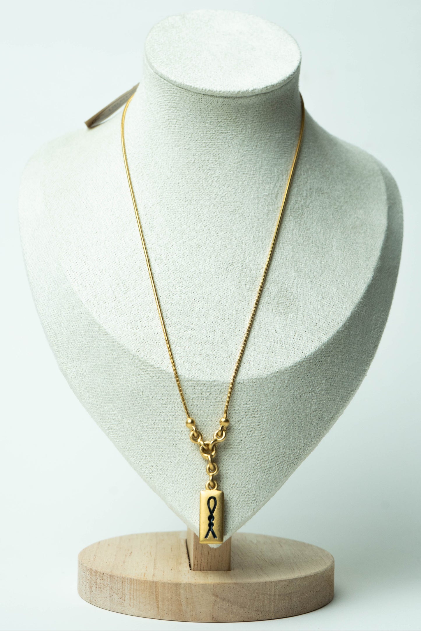 The D’Orlan Tablet Silhouette Ribbon Pendant Necklace