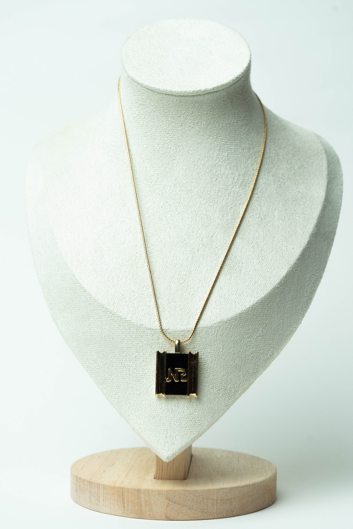 The Nina Ricci Émail Noir Monogramme Plaque Necklace