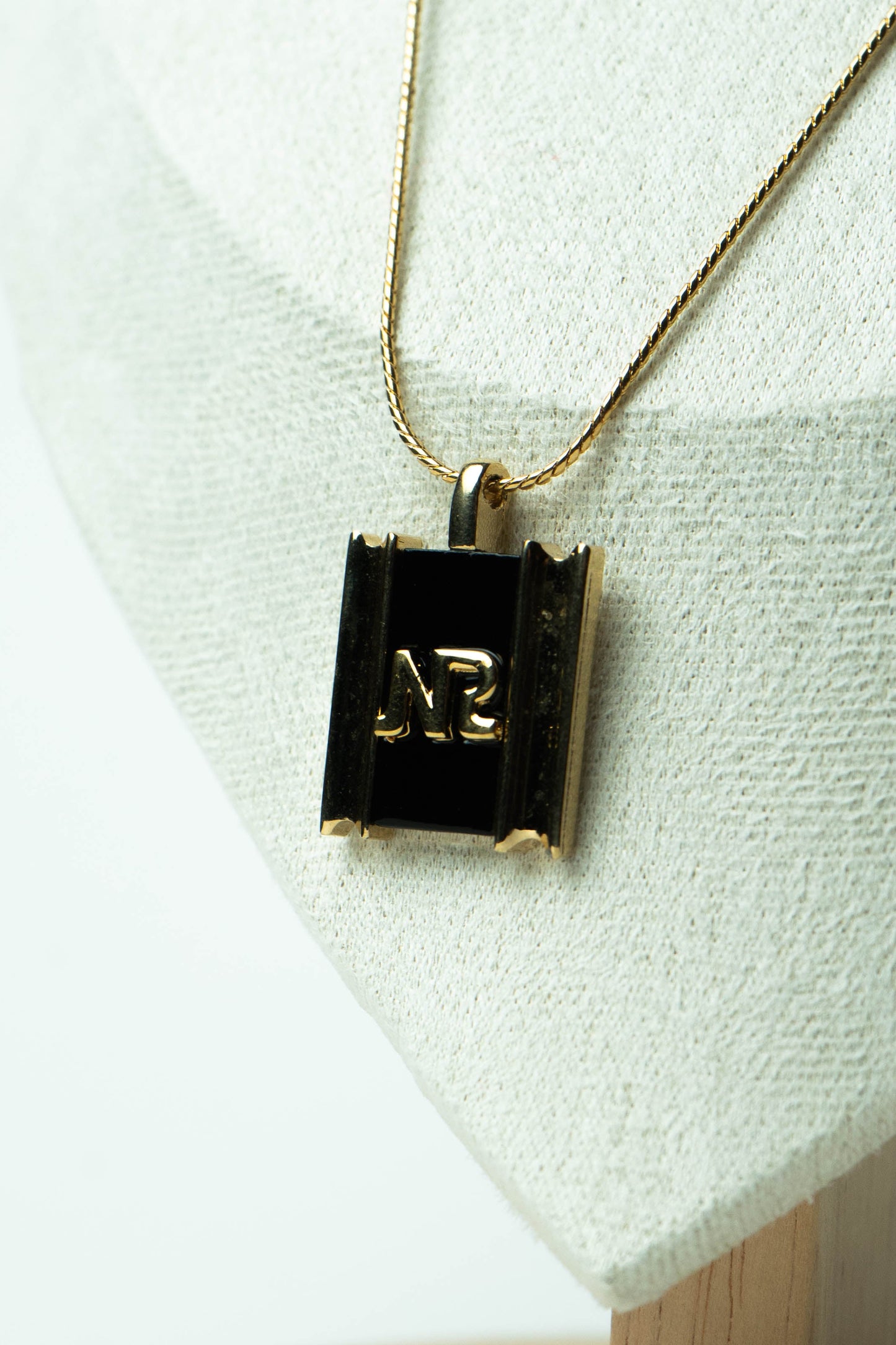 The Nina Ricci Émail Noir Monogramme Plaque Necklace