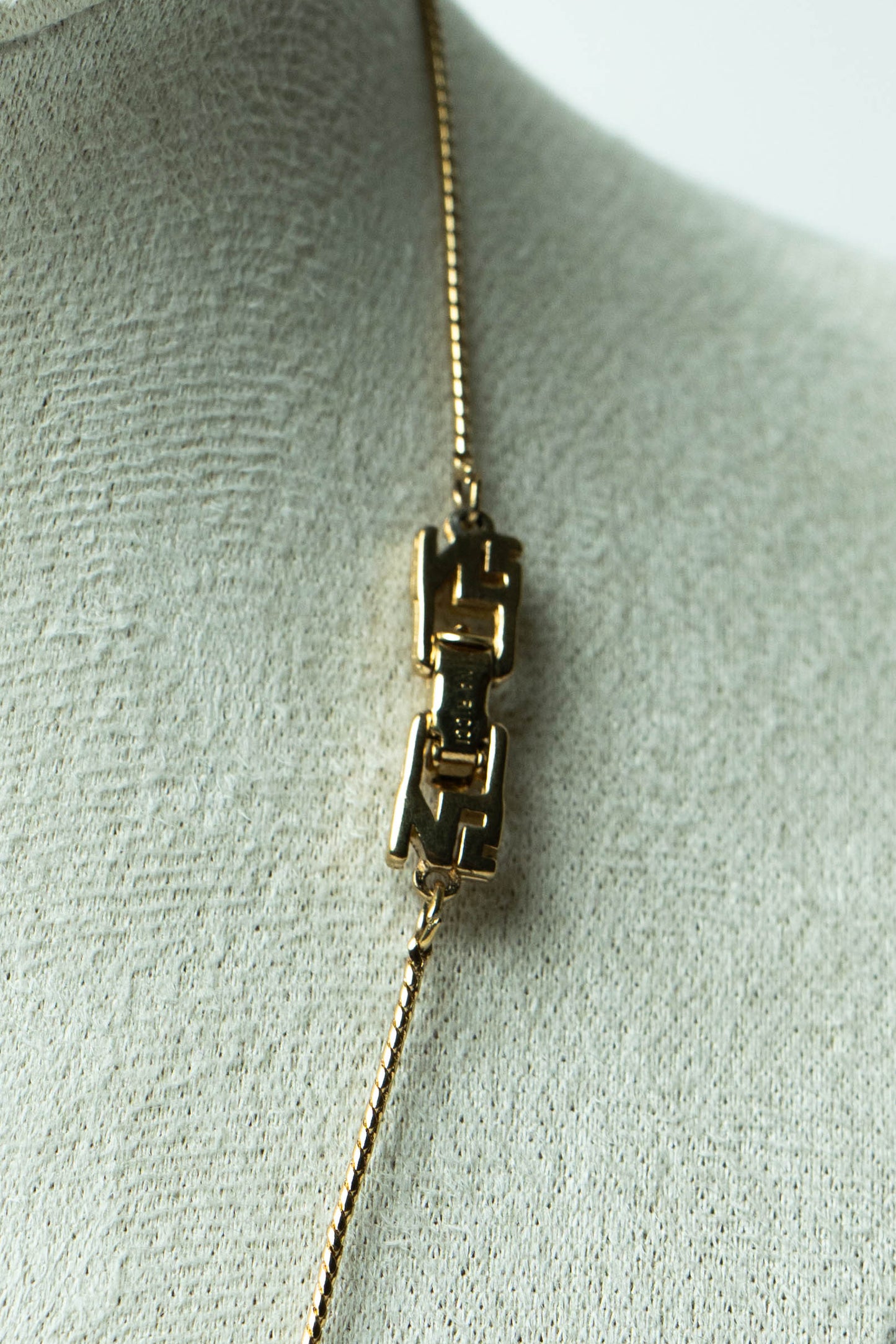 The Nina Ricci Émail Noir Monogramme Plaque Necklace