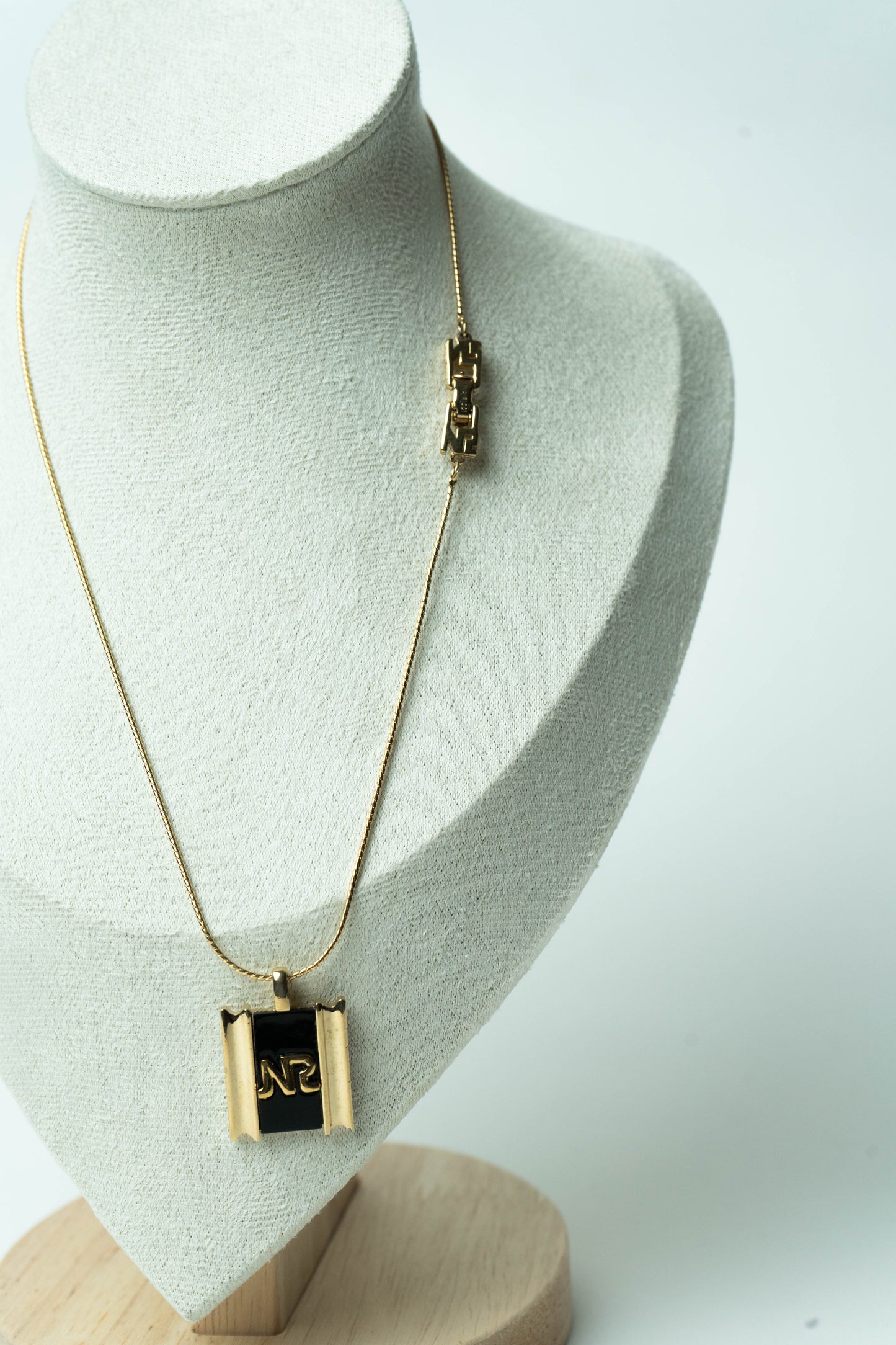 The Nina Ricci Émail Noir Monogramme Plaque Necklace
