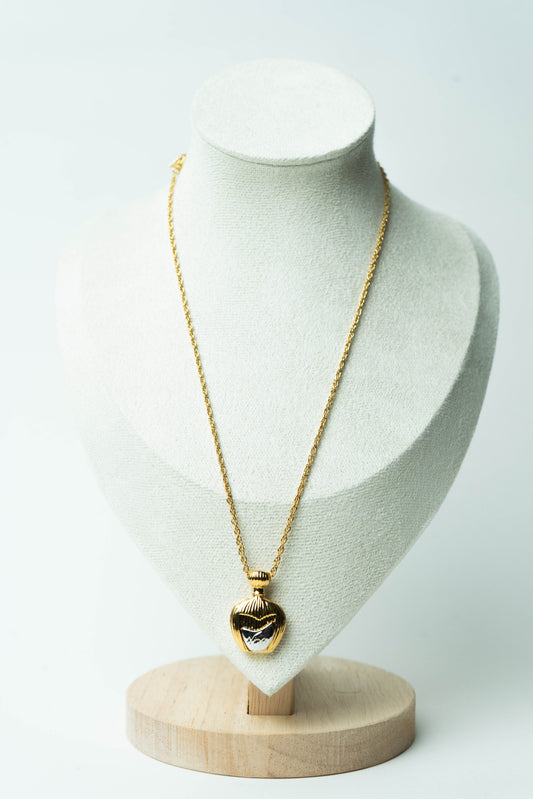 The Nina Ricci Mini Flacon de Parfum Pendant Necklace