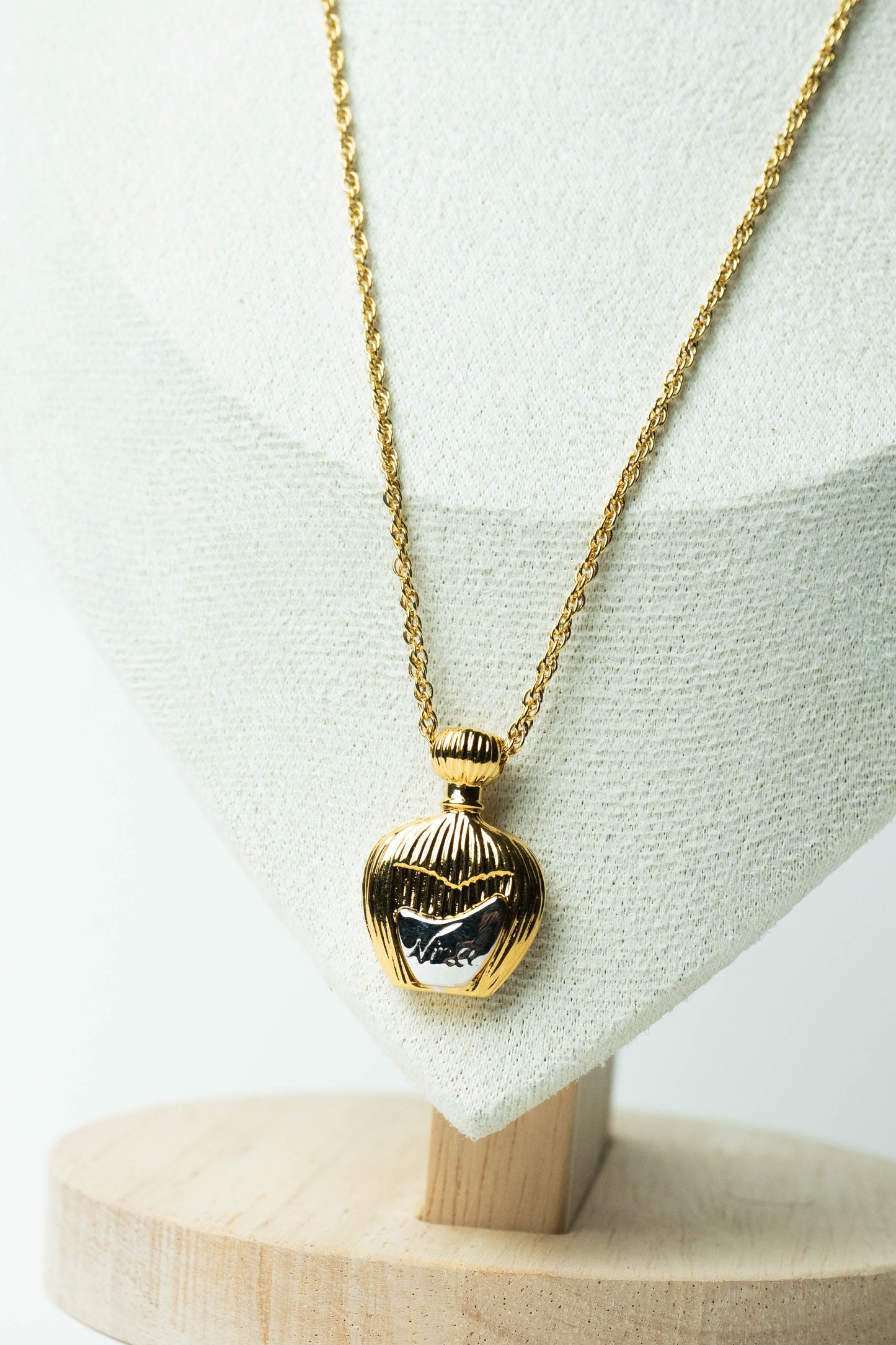 The Nina Ricci Mini Flacon de Parfum Pendant Necklace